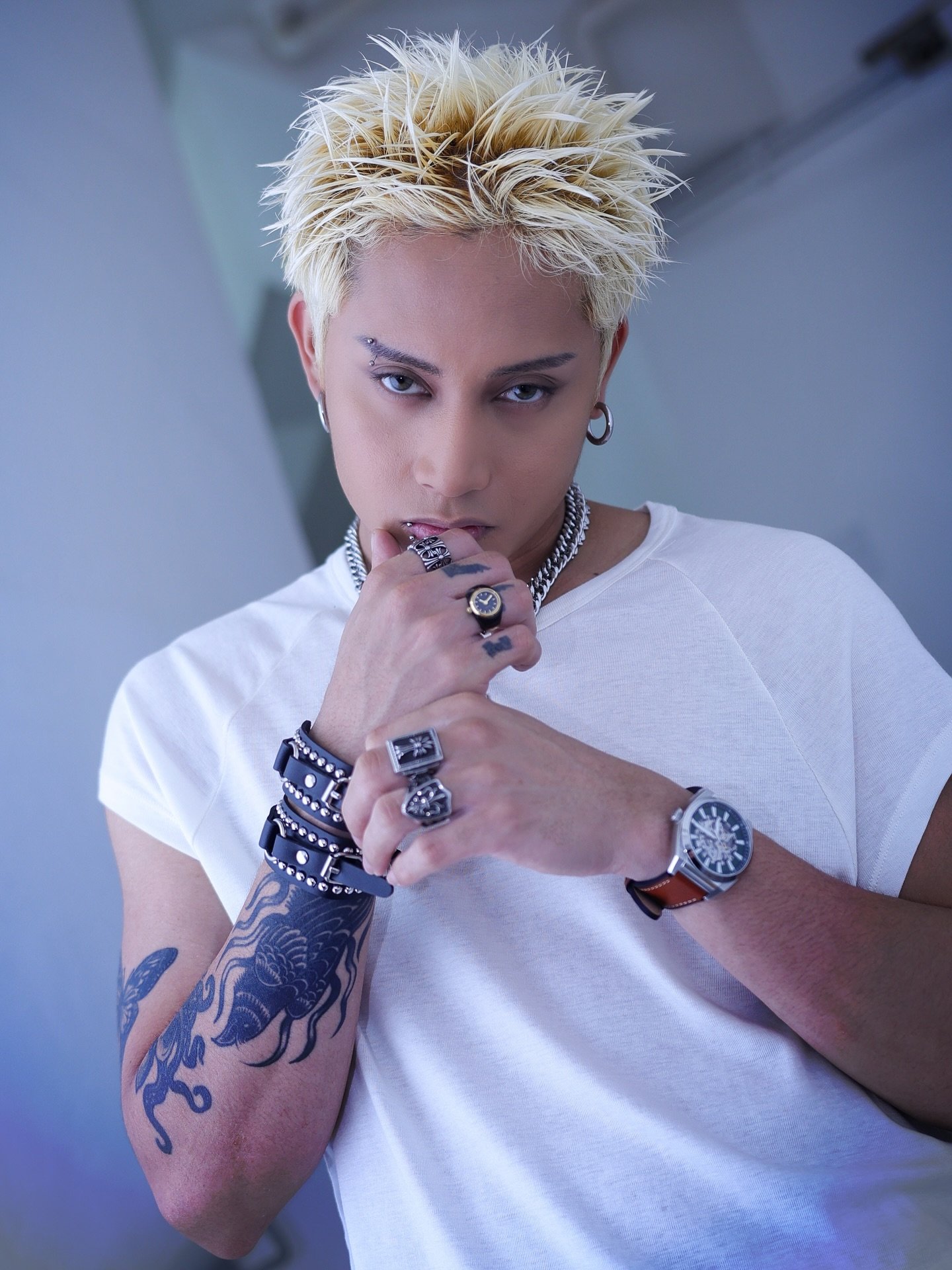 FELIP showcases a Fossil wristwatch and ring watch that complement his signature Chrome Hearts accessories