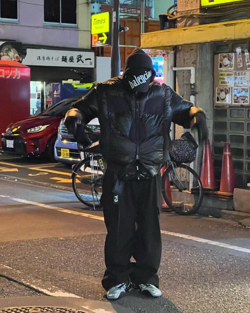 FELIP wearing a black Balenciaga Diagonal baseball cap